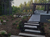 Antique Chinese granite slab paths through native planting beds, Roslyn